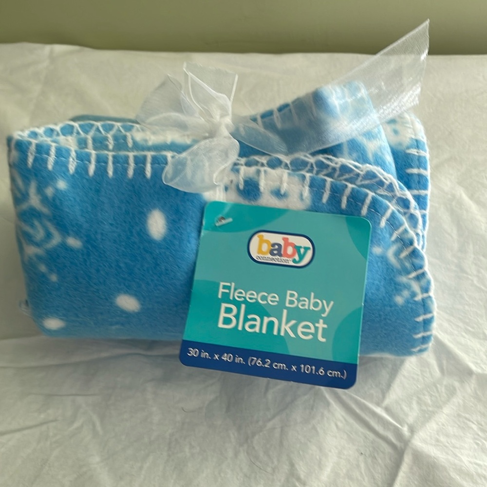 Brand new Baby Connection fleece baby blanket.